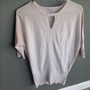 White sweater with key hole neck line